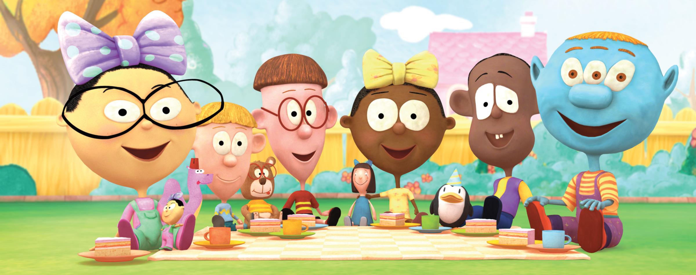 Group of animated characters having a picnic on a blanket in a sunny garden with teacups, plates, and autumn trees in the background.