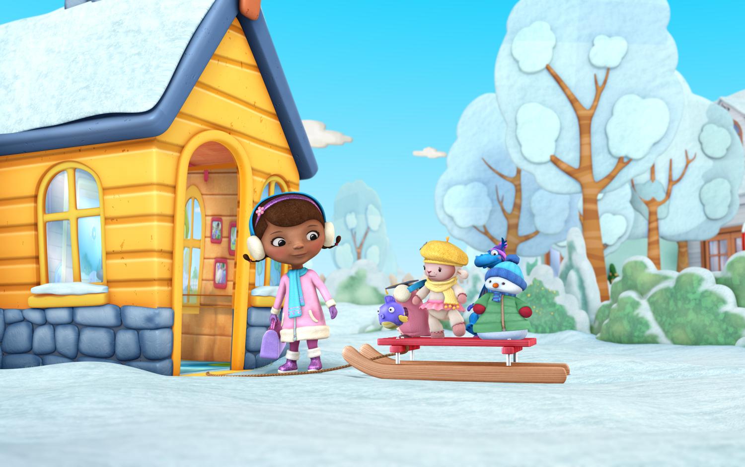 Doc McStuffins and her friends outside the clinic on a snow day. Some of her toy friends are sitting on a sled.
