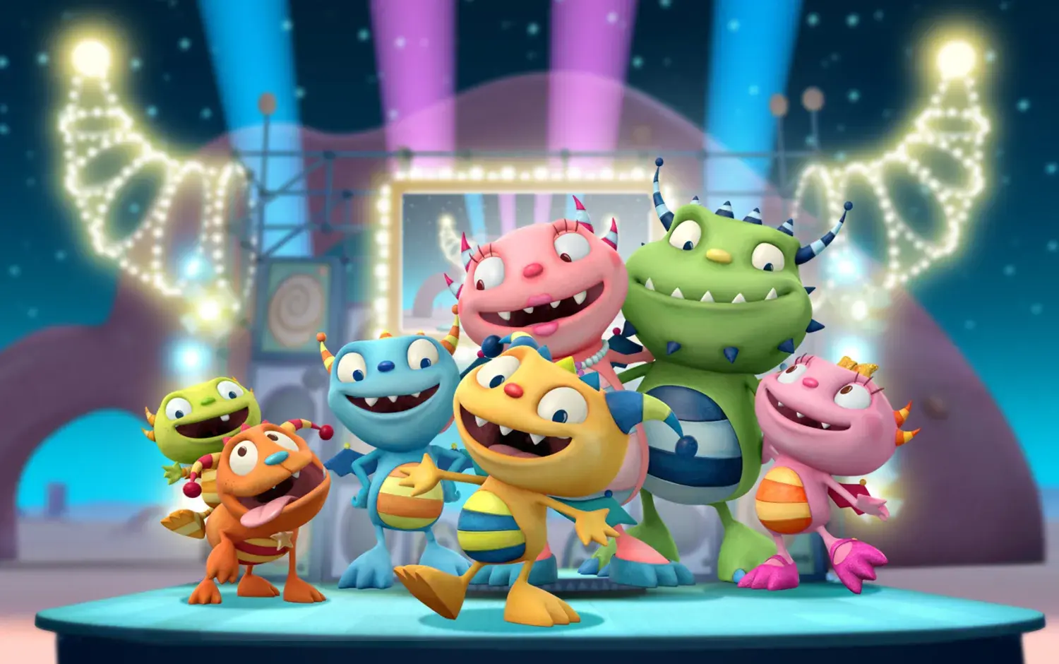 Henry and his family on a brightly lit stage