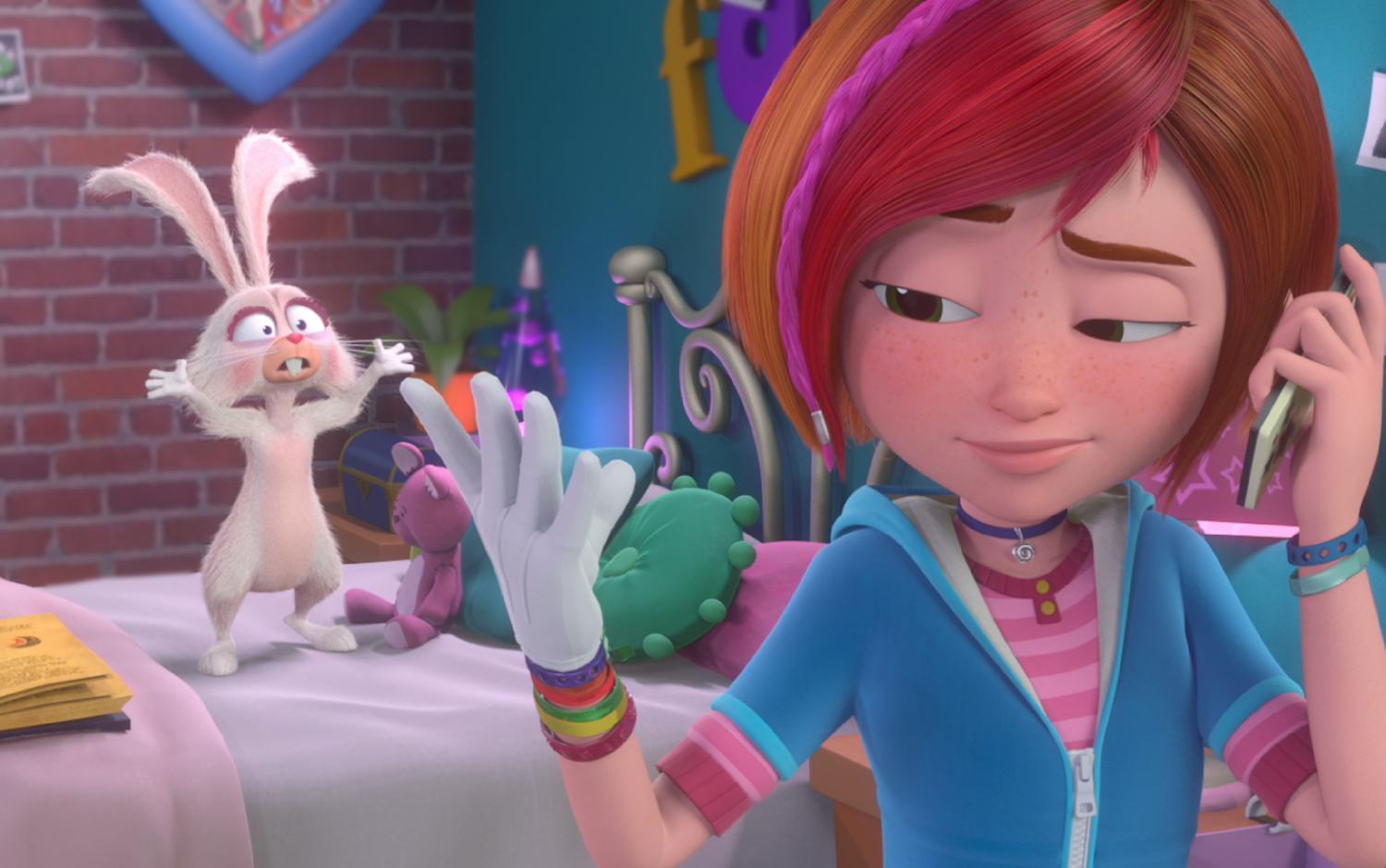 Sadie on the phone looking at her hand with Gilbert in the background looking perplexed