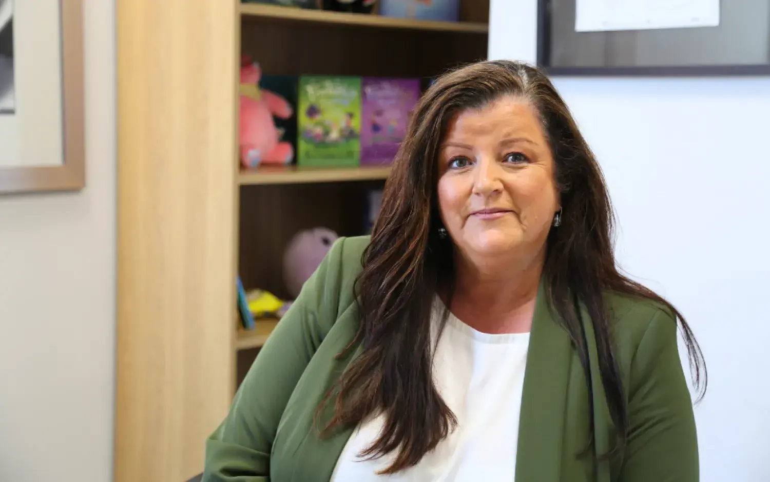 Headshot of Ciara Lynch sitting in an office
