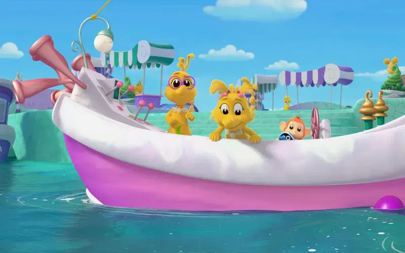 Several Sneetches on a boat in a carnival-like setting with water rides and tents.