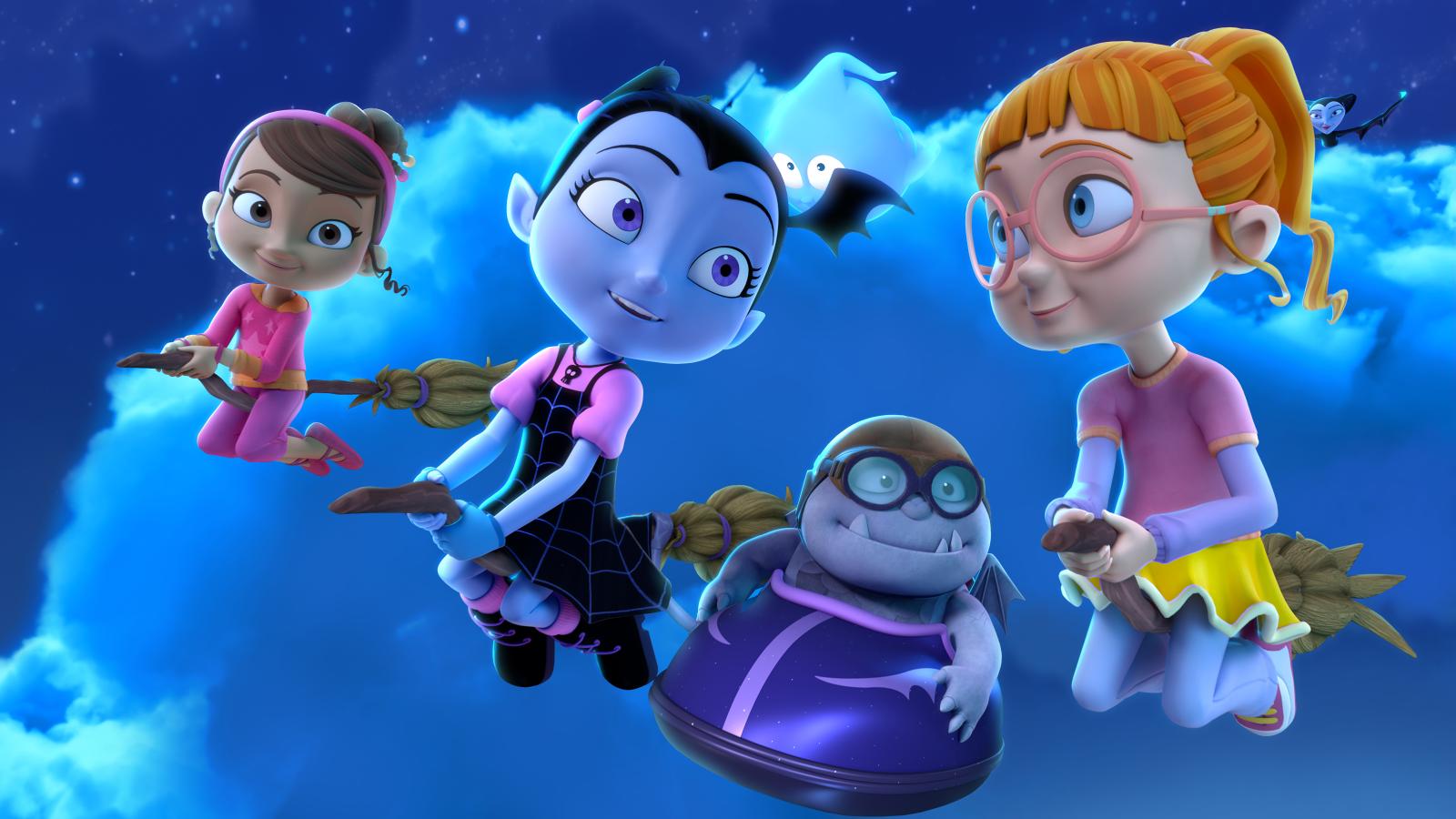 Vampirina, Poppy and Bridget flying on broom sticks in the night sky