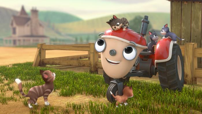 Otis with some of the farm cats and kittens