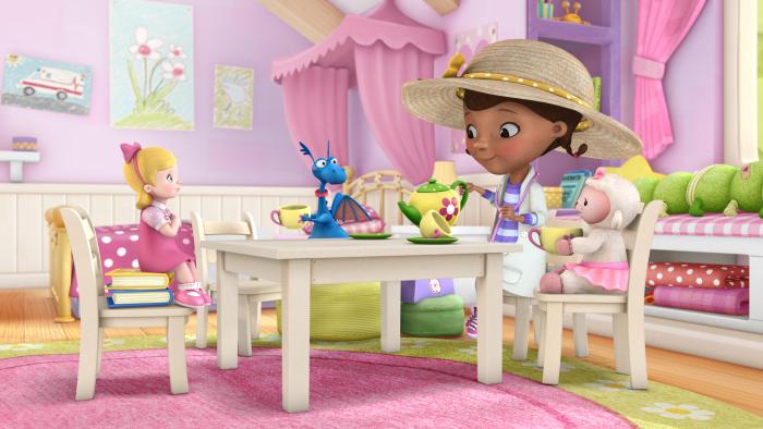 Doc McStuffins having a tea party with a doll toy