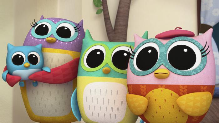 a group of owls including Eva the Owlet standing together