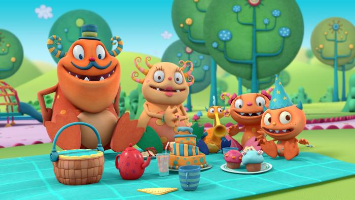 A monster family having a picnic