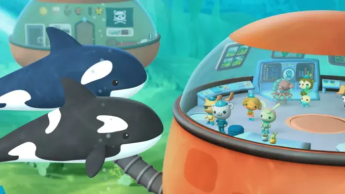 Two killer whales swimming next to the Octopod
