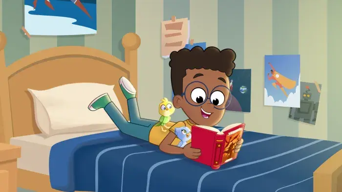 Max reading a book with Ace and Polly 
